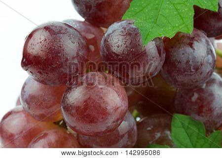 fresh red grape isolated on white background