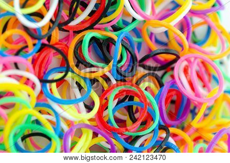 Various Colorful Plastic Tires Are On The Table.selective Clarity