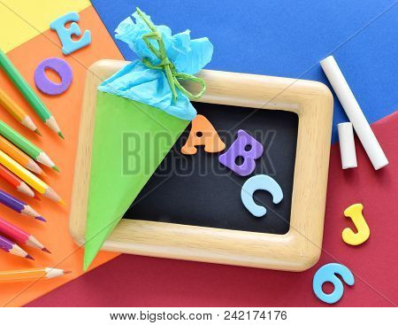 Back To School Background With Crayons And Blackboard