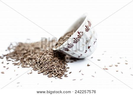 Common Cumin Or Zeera Or Jeera In A Bowl Isolated On White.