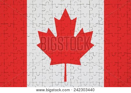 Canada Flag  Is Depicted On A Folded Puzzle