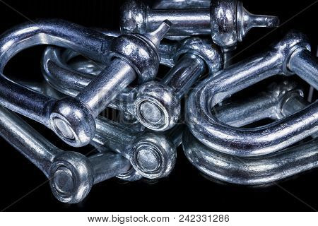 Industrial Hook On A Black Background To Mean An Industrial Concept,equipment Technician