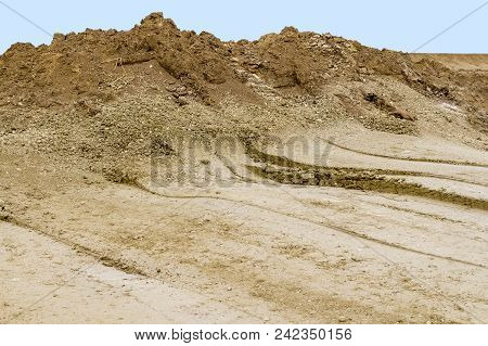 A Loamy Scenery At A Building Lot