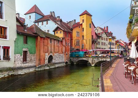 Famous Colorful Houses And Thiou River In The Morning In Old City Of Annecy, Venice Of The Alps, Fra