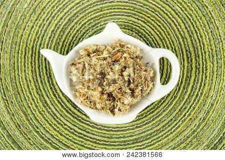 Dried Mullein Leaf Tea On A Cloth Background