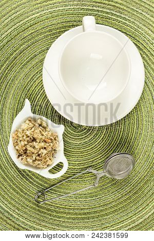 Dried Mullein Leaf Tea On A Cloth Background
