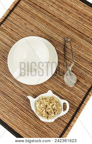 Dried Mullein Leaf Tea On A Wood Background
