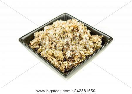 Dried Mullein Leaf Tea In A Bowl Isolated On A White Background