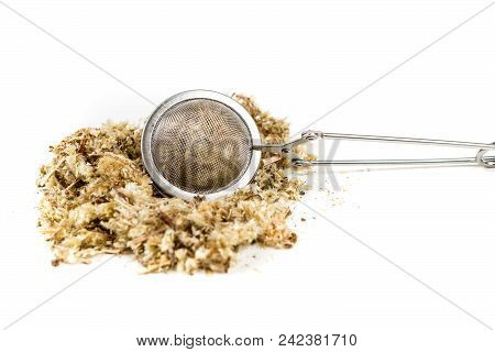 Dried Mullein Leaf Tea In An Infuser Isolated On A White Background