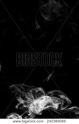 Movement Of White Smoke Isolated On Black Background.