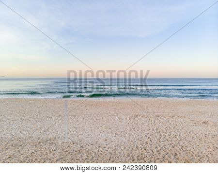 Low Drone Photo Barra Da Tijuca Beach During Sunrise, Sand Still In Shade.