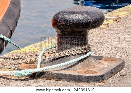 Photo Picture Of A Rusty Metal Mooring Bolard For Big Ship