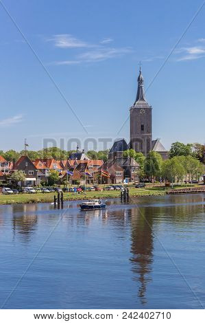Hasselt, Netherlands - May 04, 2018: River And Tower Of The Stephanus Church In Hasselt, Netherlands