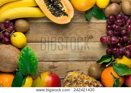 Frame With Copy Space From Fresh Tropical And Summer Fruits Pineapple Papaya Mango Coconut Oranges K