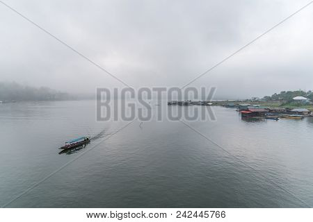 Landscape Of River And Raft Or Houseboat With Morning Mist And Coolness From Predawn Fog Is A Nature