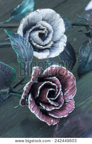 Decorative Ornamen With Roses, Made From Metal. Details, Structure And Ornaments Of Forged Iron Gate