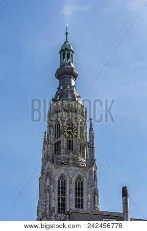 Detail Tower Of The Old Great Church Of Breda With Its Colorful Clock. Holland Netherlands
