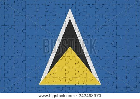 Saint Lucia Flag  Is Depicted On A Folded Puzzle