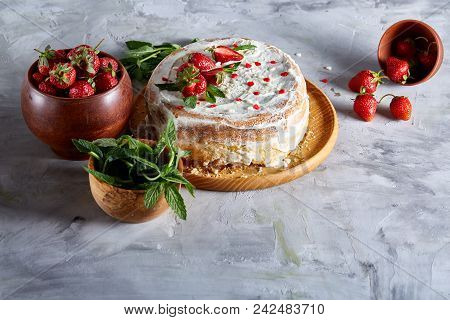 Delicious Still Life With Strawberry Tart Covered With Whipped Sour Cream, Strawberry And Mint On Wh