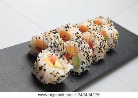 Sushi Set On Black Plate, Closeup Of Food