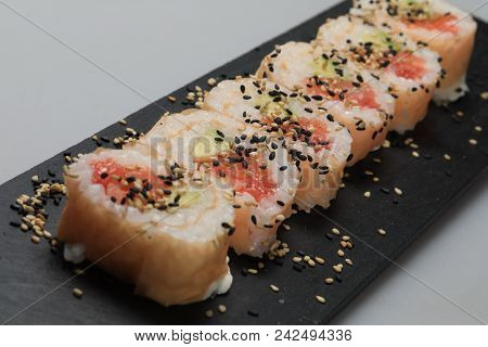 Sushi Set On Black Plate, Closeup Of Food