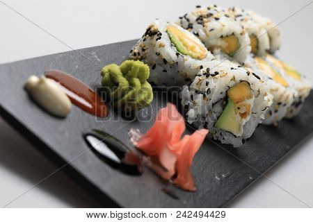 Sushi Set On Black Plate, Closeup Of Food