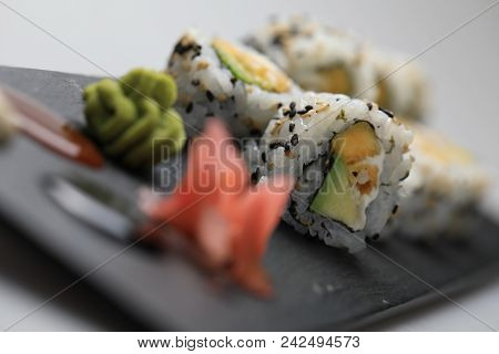 Sushi Set On Black Plate, Closeup Of Food