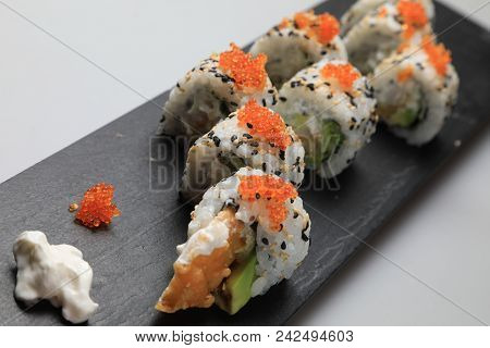 Sushi Set On Black Plate, Closeup Of Food