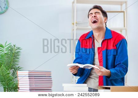 Worker in publishing house preparing book order