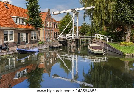 Small Wooden Bridge Over A Canal In Monnickendam, Netherlands