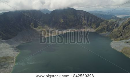 Crater Lake Of The Volcano Pinatubo Among The Mountains, Philippines, Luzon. Aerial View Beautiful L