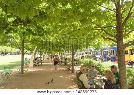 Food Truck Vendor With Customer Buy And Taste Variety Of Food