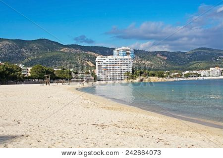 Palma, Mallorca, Spain - February 17, 2018: Palma Nova Beach, Hotel And Mountains On An Overcast Day