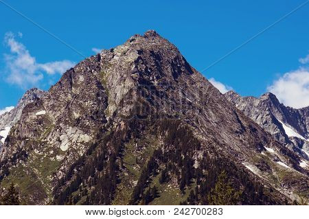Mountain Landscape. The Top Of The Mountain On The Background Of Blue Sky