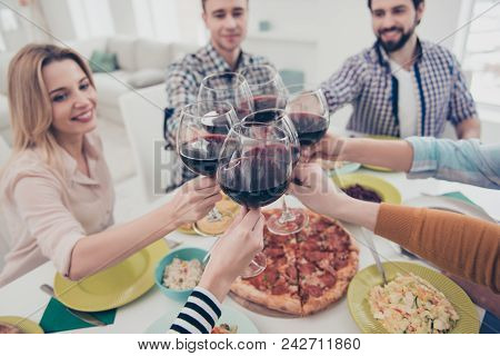Cropped Close Up Portrait Of Clinking Glasses With Red Wine Of Best Friends, Guests, Visitors Indoor