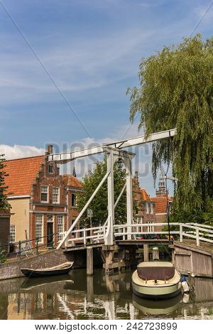 Small Wooden Bridge Over A Canal In Monnickendam, Netherlands
