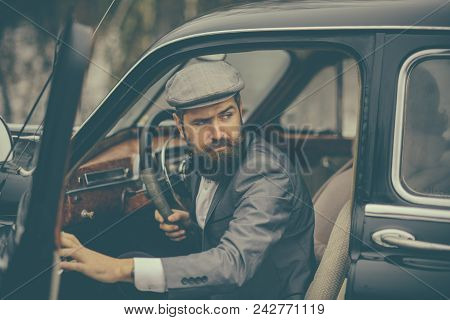 Escort Man Or Security Guard. Escort Service Of Bearded Man In Retro Car