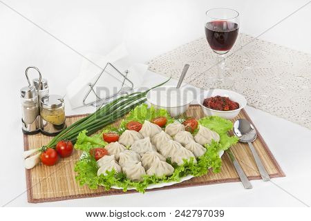 Kinkali In Green With Tomatoes And Onions. Serve With Soy Sauce And Sour Cream.