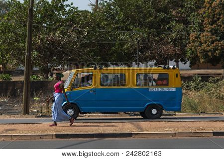 Bissau, Republic Of Guinea-bissau - January 31, 2018: Street Scene In The City Of Bissau With A Woma