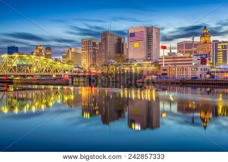 Newark, New Jersey, USA skyline on the Passaic River at dusk.