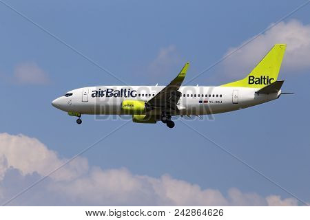 Borispol, Ukraine - May 25, 2018: Yl-bbj Air Baltic Boeing 737-300 Aircraft On The Cloudy Sky Backgr