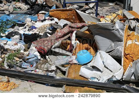 Landfill Or Garbage Dump With Many Broken Trash