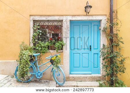 Still Life With Blue Bicycle At Door And Window Of A House In Rovinj, Croatia, Europe.