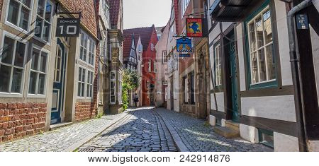 Bremen, Germany - August 23, 2017: Panorama Of A Cobblestoned Street In The Schnoor District Of Brem