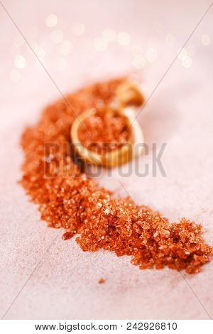 Hawaiian Red Gold Salt with wooden spoon on pink marble