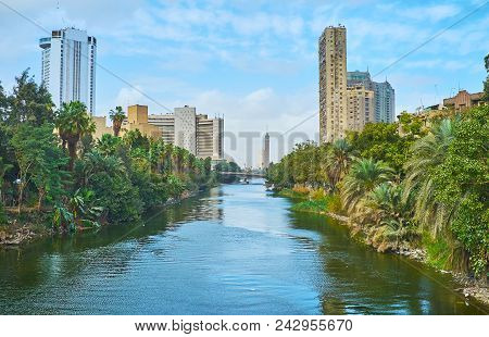 The Walk From The Downtown District To Rawdah Island With A View On Green Gardens, Modern High-rises