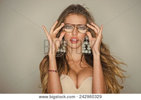 Woman Face Beauty. Woman With Big Breasts Wears Old Fashioned Eyeglasses For Vision. Optics Shop Con