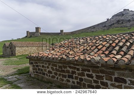 Genoese Fortress In Sudak, Crimea. Cloudy Day, Early April.