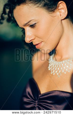 Young Cute Brunette Portrait Posing At Sunset