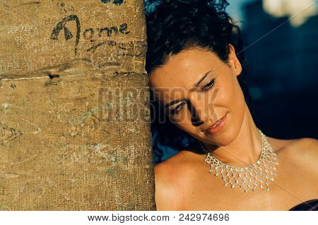 Young Cute Brunette Portrait Posing At Sunset